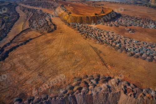 Preview: Huge mounds of waste iron ore near the quarry