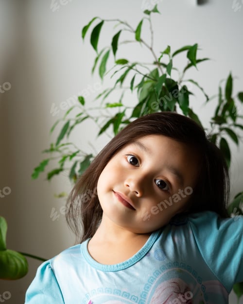Preview: portrait of cute toddler girl at home, happy child