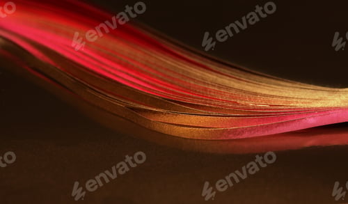 Preview: Soft focus Abstract background. Gold (bronze) paper wave on black.