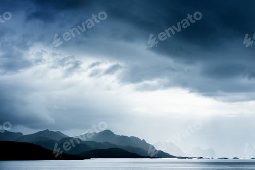 Preview: Moody and dramatic coastal landscape under stormy skies