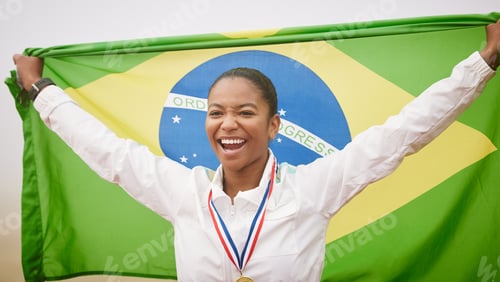 Preview: Cropped portrait of an attractive young female athlete celebrating a victory for her country