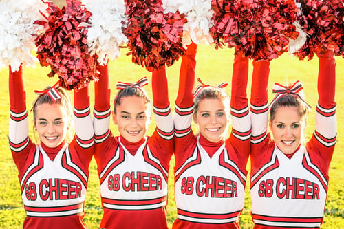 Preview: Cheerleaders team performing outdoors