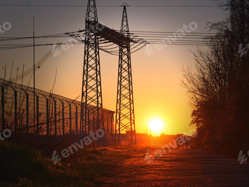 Preview: Electrical power tower and lines on a sunset background