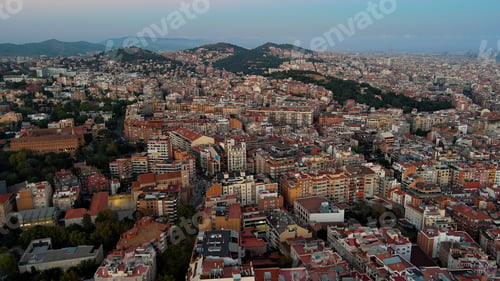 Preview: Aerial view of Barcelona city at dusk, Gracia and Horta Guinardo districts