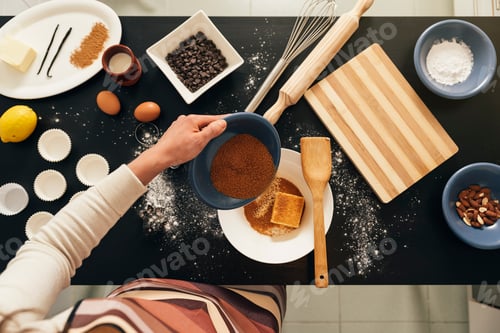 Preview: Beautiful woman Preparing Cookies And Muffins.