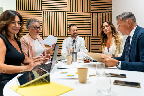 Preview: Business people working together in modern office meeting room