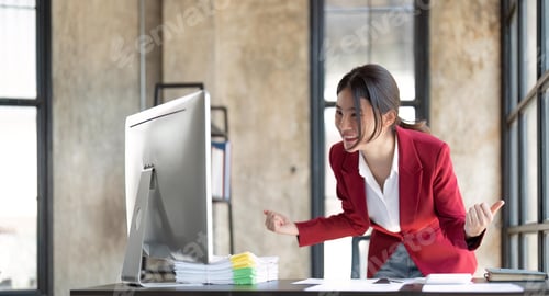 Preview: Happy businessman celebrating success of completed project economic business in the office