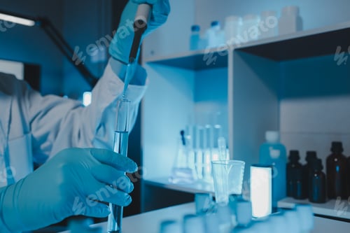 Preview: a scientist is working in a laboratory, a chemical researcher is preparing sample for a vaccine agai