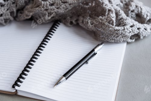 Preview: Selective focus table. Businessman hand write notebook, mobile phone, laptop