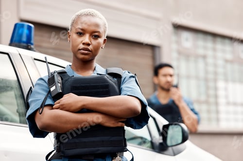 Preview: Black woman, police and arms crossed in city for law enforcement protection or street safety. Portr