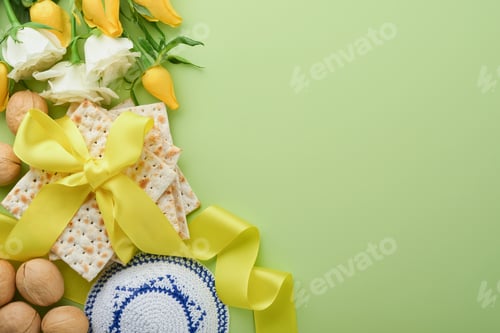 Preview: Passover celebration concept. Matzah, kosher red wine, walnut and spring white and yellow rose flowe