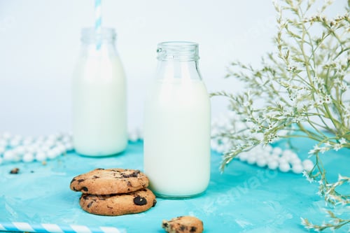 Vorschau: Keksschokolade mit Milchflaschen.