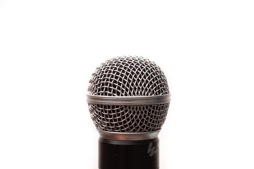 Preview: Closeup shot of a microphone isolated on a white background