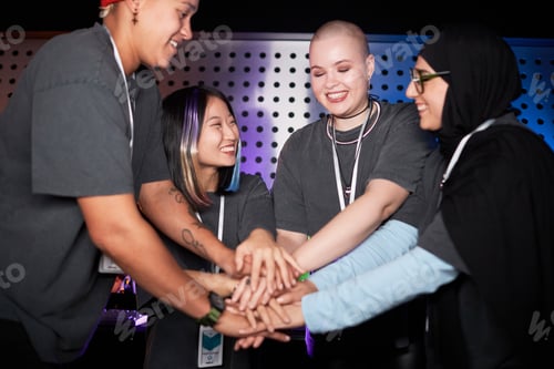 Preview: Female team celebrating victory on stage