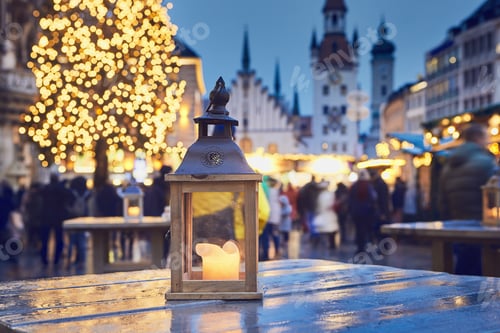 Preview: Traditional Christmas market in city. Lantern with burning candle. Munich, Germany.