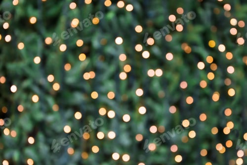 Preview: Christmas abstract background. Blurred golden garland blur bokeh, defocused pattern.