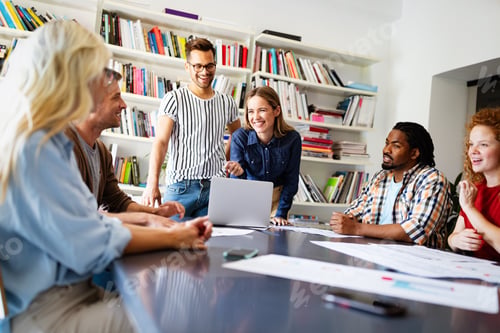 Preview: Successful company with happy employees in modern office