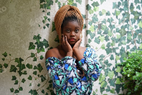 Preview: Portrait of attractive black skin young woman, Charming Afro girl. Portrait of afro girl looking at