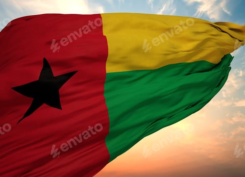 Preview: Closeup view of the waving flag of the Guinea-Bissau on a background of sunset
