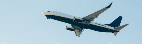 Preview: Panoramic shot of aeroplane with blue sky at background