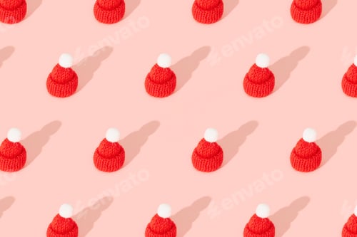 Preview: Toy mini hat on a pink background with long shadows. Clothes winter sale concept