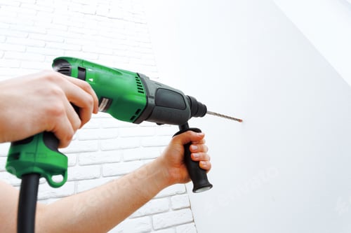 Preview: Use hammer drill to drill the wall