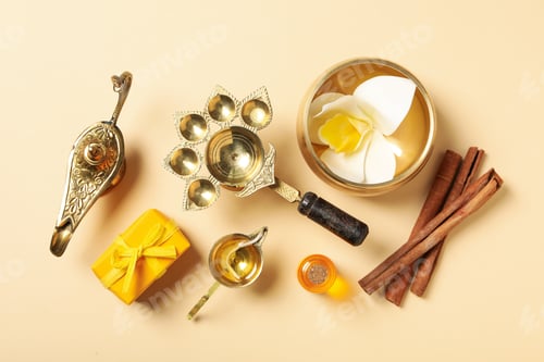 Preview: Copper utensils, cinnamon and gift box on beige background, top view