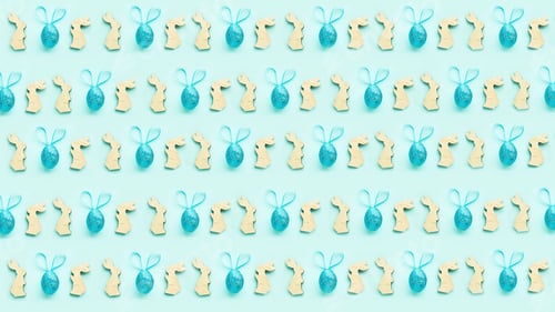 Preview: colorful background for easter, wooden bunnies and Easter eggs with ears