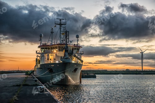 Preview: Guided missile destroyer on the wavy sea under the breathtaking cloudy sky
