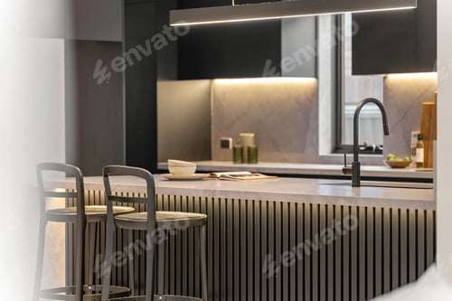 Preview: Kitchen interior with a minimalist design, featuring a sleek countertop, bar stools
