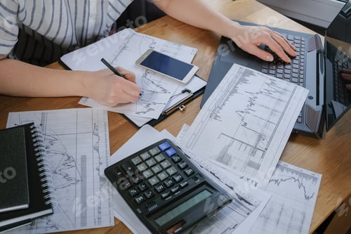 Preview: Investments. Young woman investor buys stocks on the stock exchange stock market