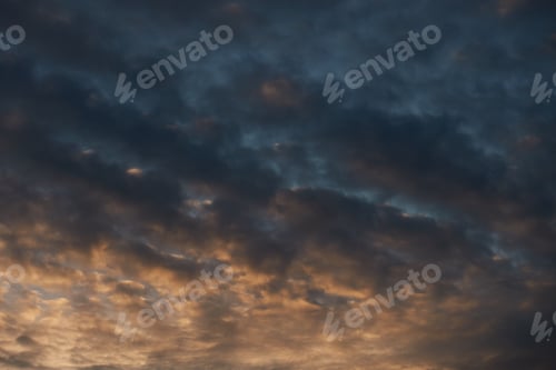 Preview: Low angle shot of a dark stormy sky at sunset