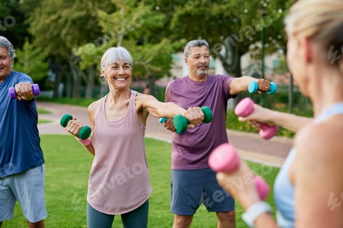 Preview: Senior people lifting dumbbells at city park
