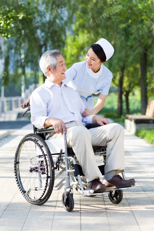 Preview: Nurse with wheelchair bound patient