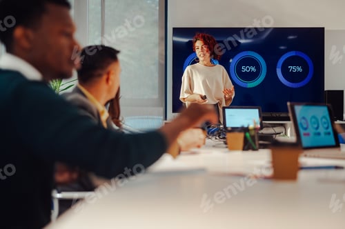 Preview: Female hispanic team leader discussing with creative team during a meeting