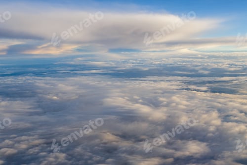 Preview: blue sky with the clouds from the plane view