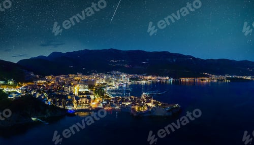 Preview: Panorama of night city with electric lights against the backdrop