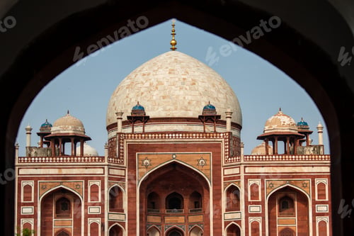Preview: Humayun's Tomb framed by arch in Delhi, India, showcasing Mughal architecture