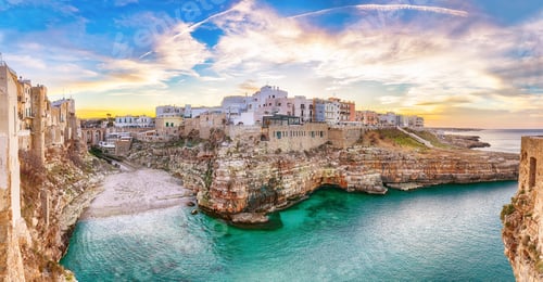 Preview: Stunning sunset at Cala Paura gulf with Bastione di Santo Stefano and Lama Monachile beach