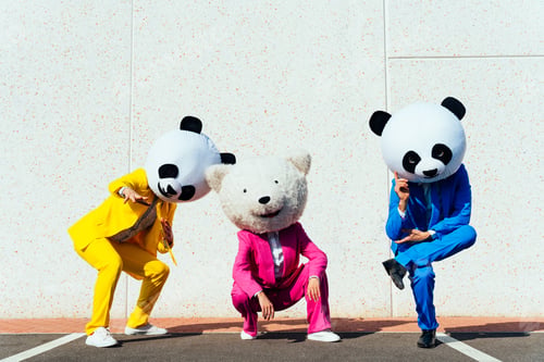 Preview: Storytelling image of a couple wearing giant panda head