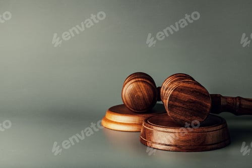 Preview: Judge gavel close up on paper background. Law and justice, legality concept