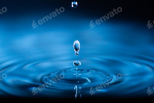 Preview: abstract background of blue water splash falling drop on liquid wave