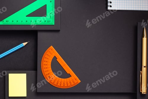 Preview: school accessories and office supplies at black background surface