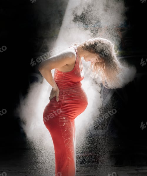 Preview: Dancer caught in a dynamic swirl of dust and light.