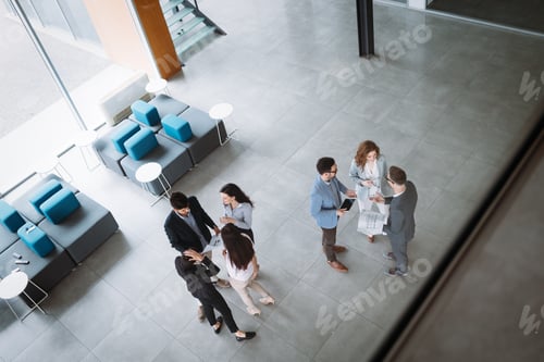 Preview: Professional business people working together on project