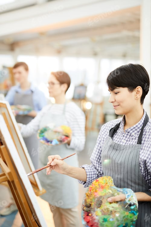 Preview: Smiling Artists Working in Studio