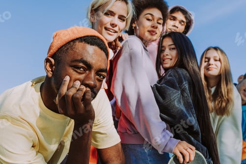 Preview: Friends Smiling Together Under a Clear Blue Sky