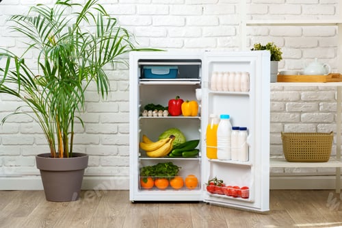 Preview: Open White Refrigerator With Fresh Produce In A Kitchen