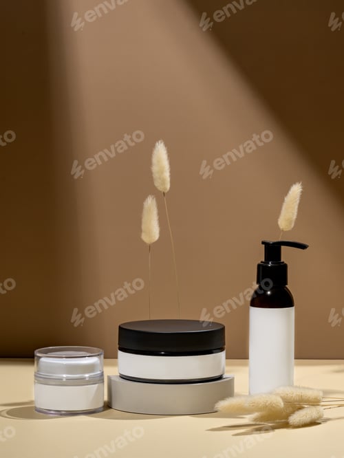Preview: Mock up glass dropper bottles on a white podium on a beige background with hard shadows. Skin care