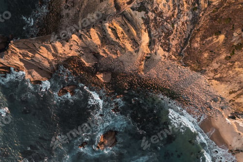 Preview: Sea waving near rocky shore